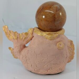 Golden Healer Quartz Sphere On Hand Sculptured Fish Stand